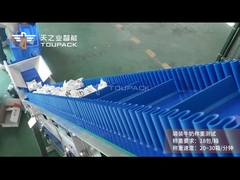 TOUPACK System voor het wegen en kartoneren van melk in zakken